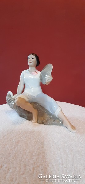 Porcelain statue. Lady on a Rock. Hand-painted statue, 15.5 cm high. Presumably North Korean.