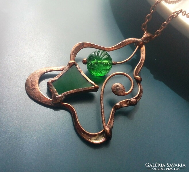 Green glass jewelry pendant with dark green glass and pearls