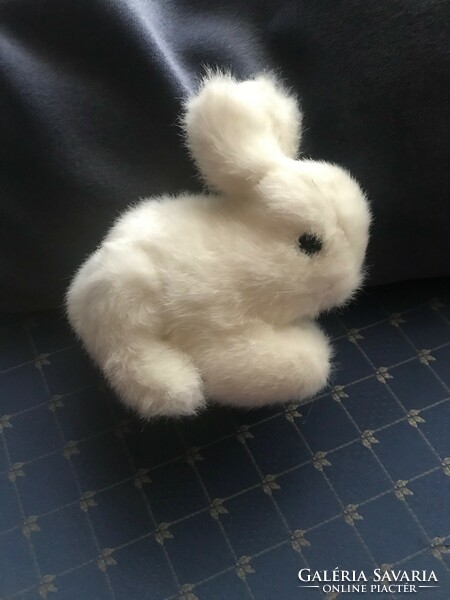 Beautiful snow white bunny. With a big mustache and black eyes. Size. 20X18 cm
