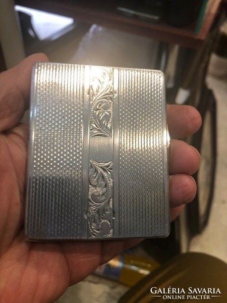 Silver cigarette case, size 10 x 10 cm, marked.