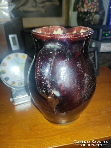 Old glazed ceramic jug
