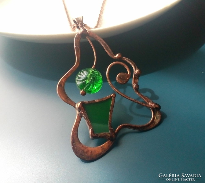 Green glass jewelry pendant with dark green glass and pearls