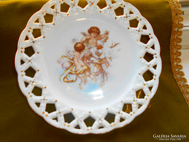 Antique Austrian plate with putts with an openwork border, 18.5 cm