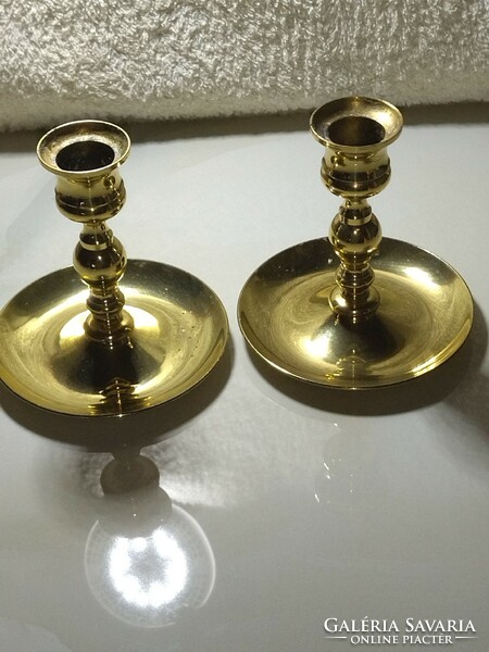 A pair of beautiful old copper candlesticks