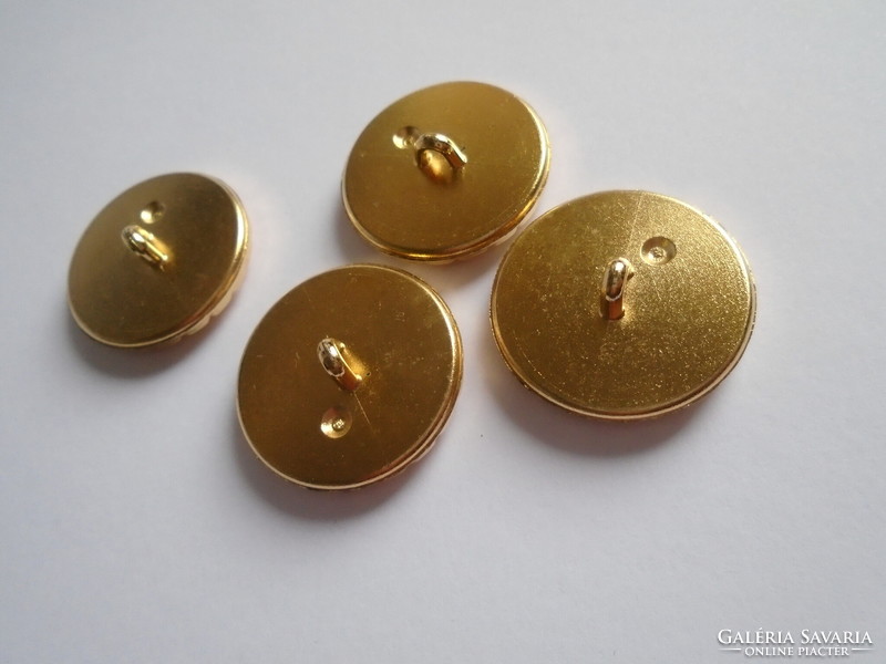 4 Pcs. Gold colored, decorative new metal buttons.