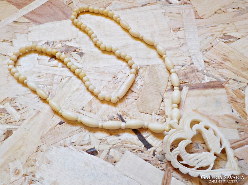 Necklace carved from old bone