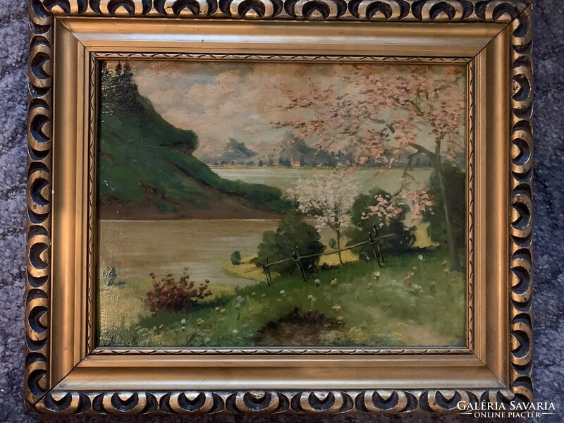 Oil painting with the title / riverside landscape, in a gilded frame