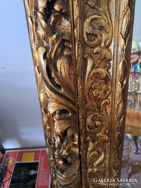Carved mirror, large gilded and metallic