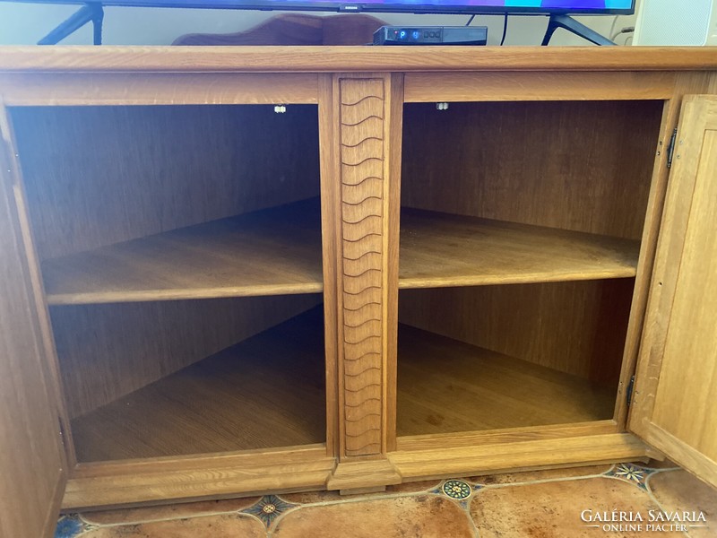 Carved oak corner cabinet/chest with hunting motifs