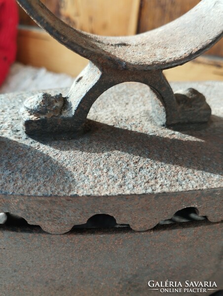 Old cast iron charcoal iron