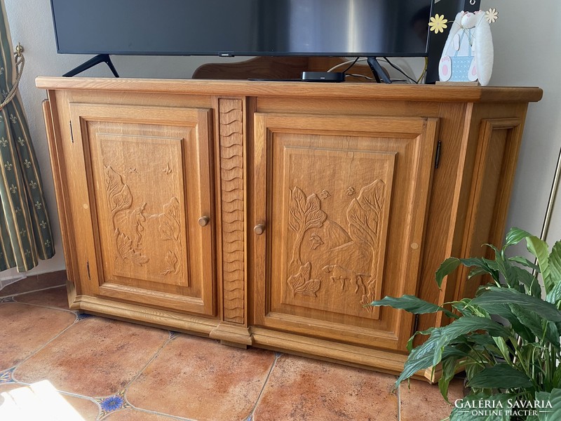 Carved oak corner cabinet/chest with hunting motifs