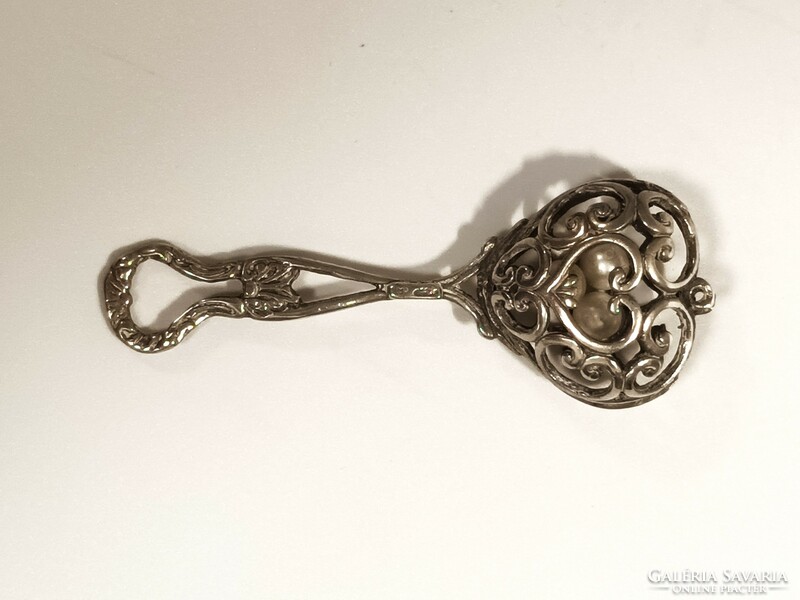 Silver decorative rattle