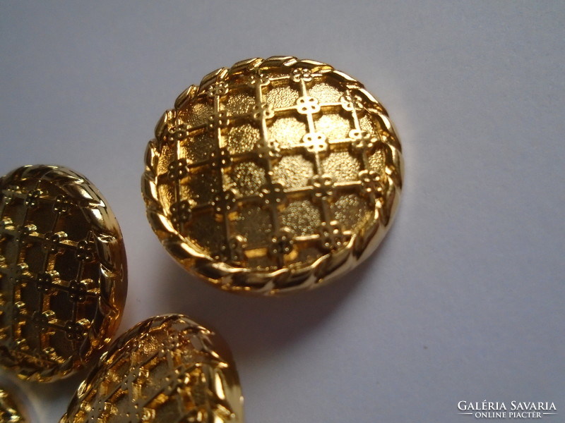 4 Pcs. Gold colored, decorative new metal buttons.