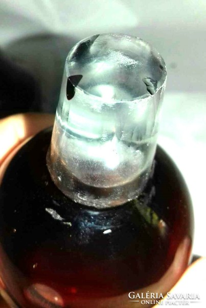 Special larger-sized incised crimson glass bottle