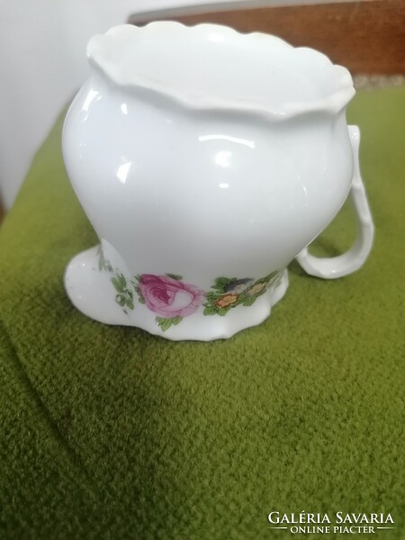 Antique porcelain milk jug with memorial inscription, which is worn
