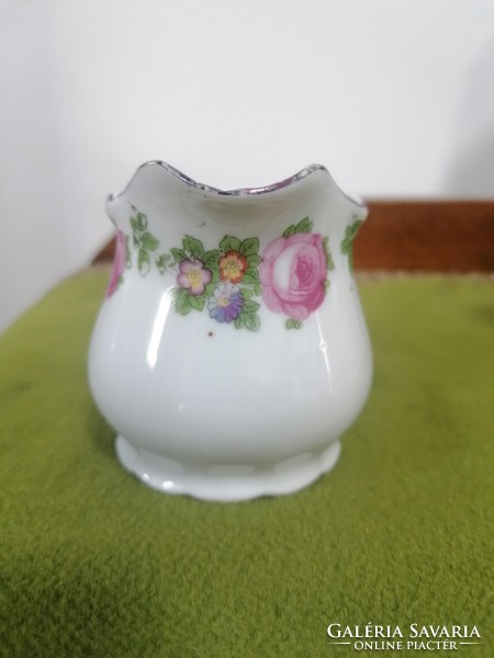 Antique porcelain milk jug with memorial inscription, which is worn