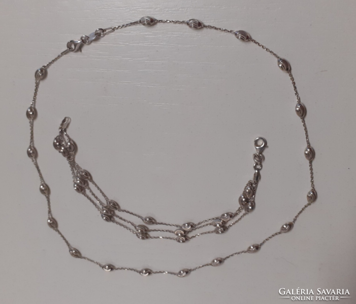 Necklace with three-row bracelet made with intricately engraved patterned eyes in silver