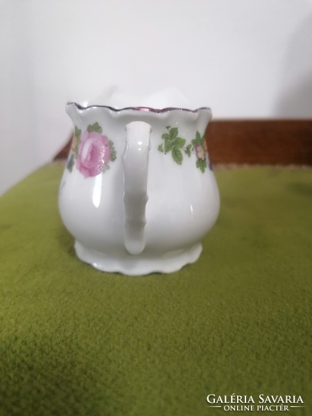 Antique porcelain milk jug with memorial inscription, which is worn