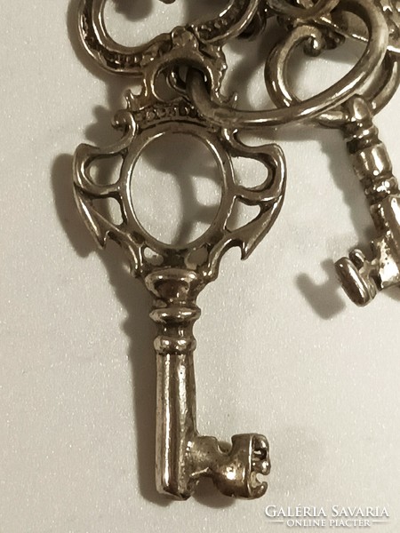 Silver keys, symbols of love, life, strength, health