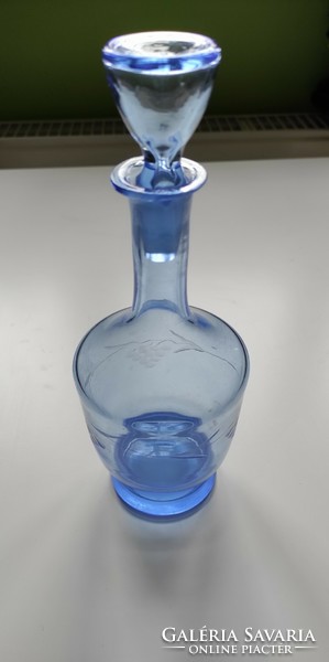 Blue wine glass with cork