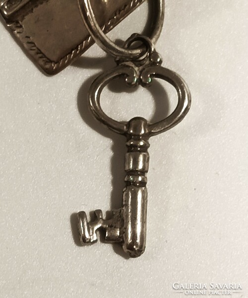 Silver keys, symbols of love, life, strength, health