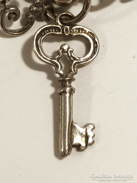 Silver keys, symbols of love, life, strength, health