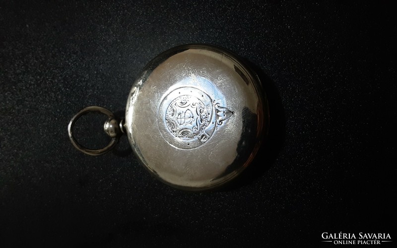 Silver pocket watch with chain drive mechanism. (Spindle)