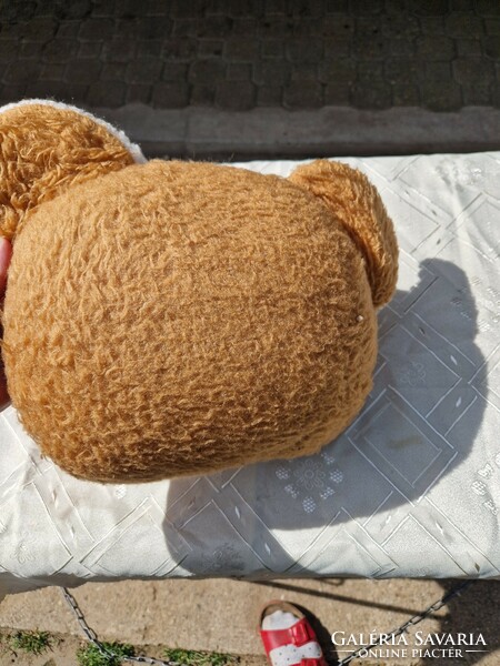 A retro teddy bear head pillow? Plush