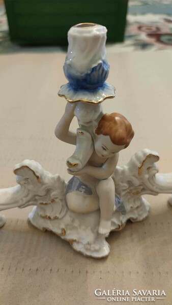 Crown regent fine porcelain, baroque style, three-pronged candle holder with putto