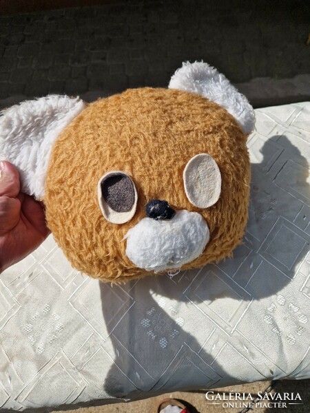 A retro teddy bear head pillow? Plush