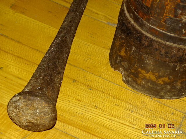Antique carved wooden mortar with wrought iron pestle