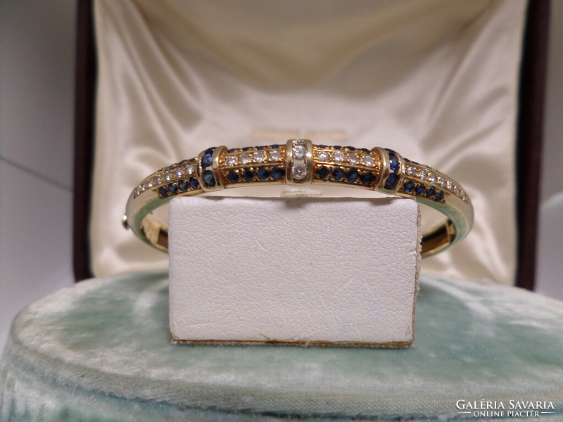 Gold bracelet / carreif with blue sapphires and glasses