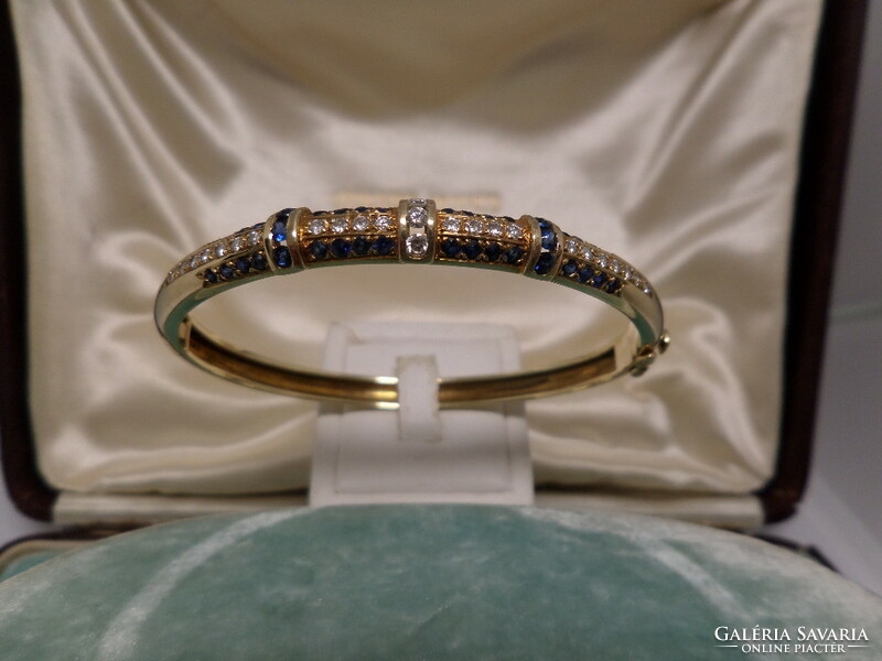 Gold bracelet / carreif with blue sapphires and glasses