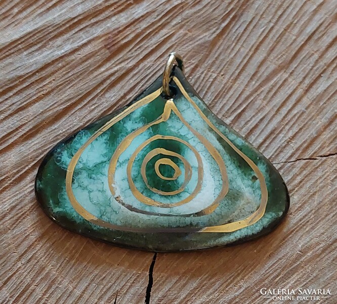 Large green fire enamel pendant with a gilded spiral motif from Austria