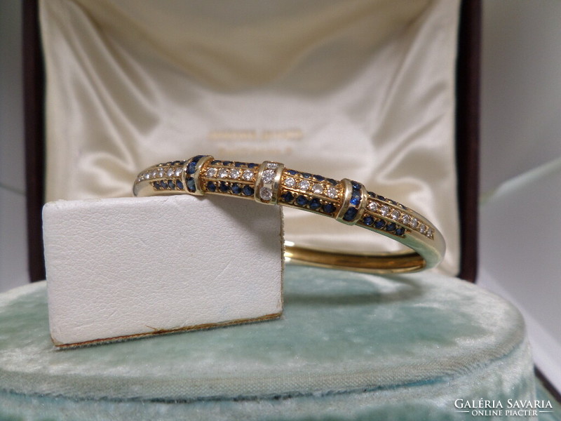 Gold bracelet / carreif with blue sapphires and glasses