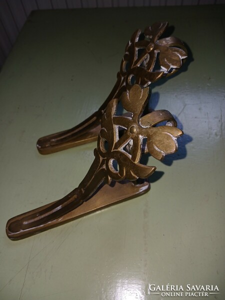 A pair of Art Nouveau copper cornice support rods