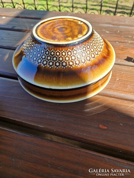 Brown patterned ceramic bowl granite?