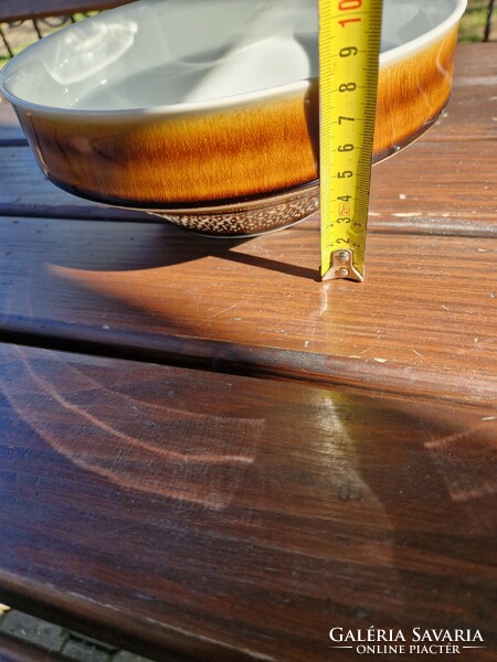 Brown patterned ceramic bowl granite?