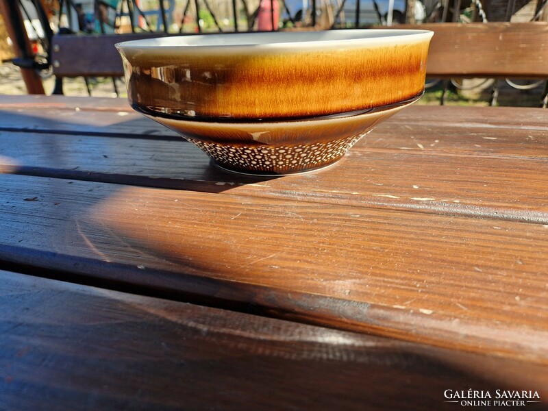 Brown patterned ceramic bowl granite?