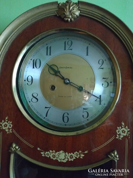 Jantar 3-stick pendulum wall clock with mechanical clock mechanism