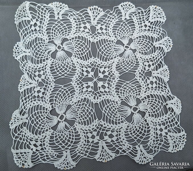 Old lace tablecloth, needlework, porcelain, decorative object under porcelain 25 x 25 cm.