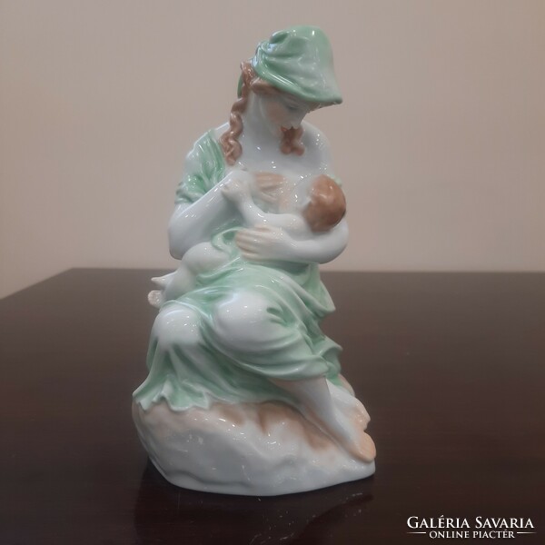 Motherhood in Herend, porcelain figure of a nursing mother with her child