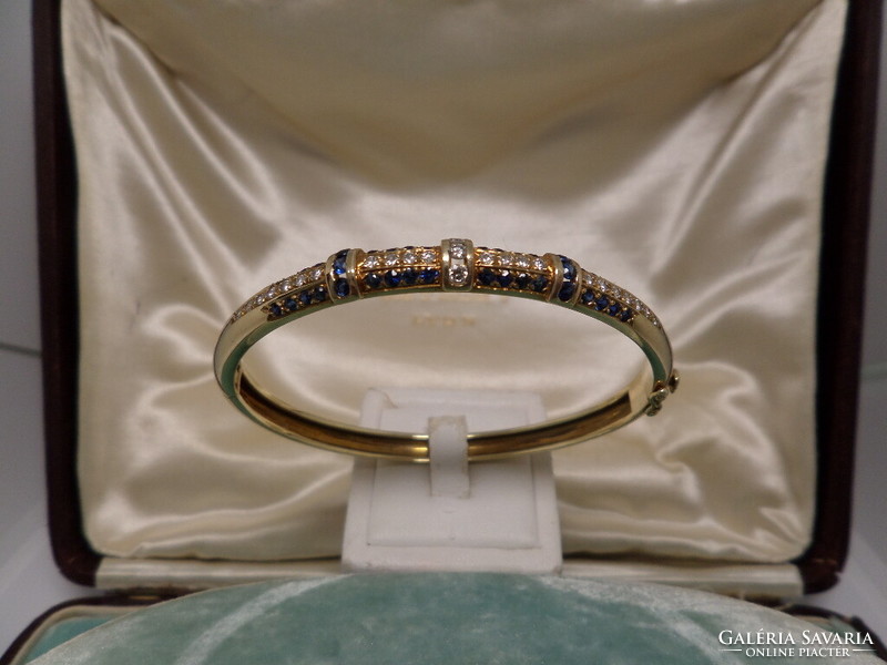 Gold bracelet / carreif with blue sapphires and glasses