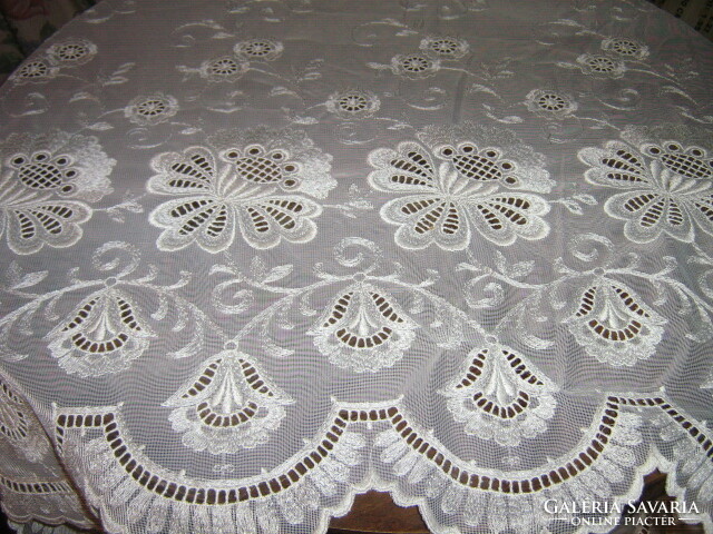 Beautiful fabric made of elegant curtains embroidered in Madeira