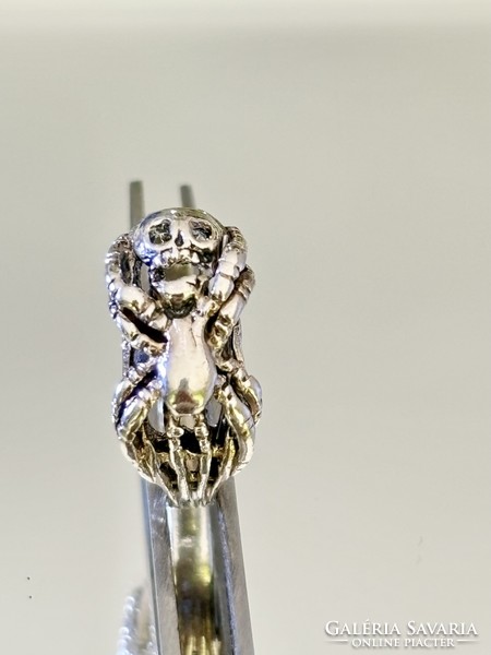 Cool silver ring with a spider and skull motif