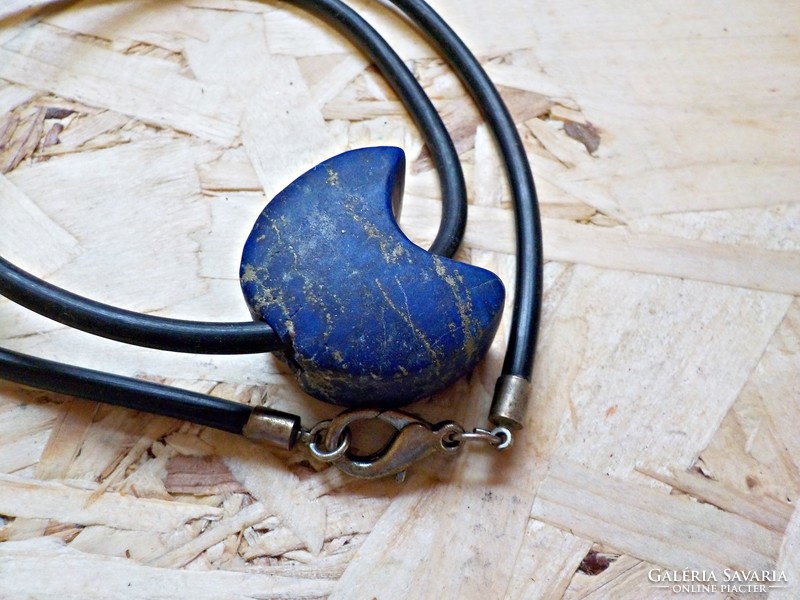 Large polished lapis lazuli mineral rubber on a chain