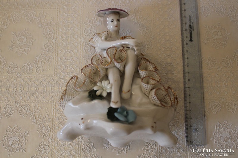 Porcelain female ballerina statue in lace dress with hat