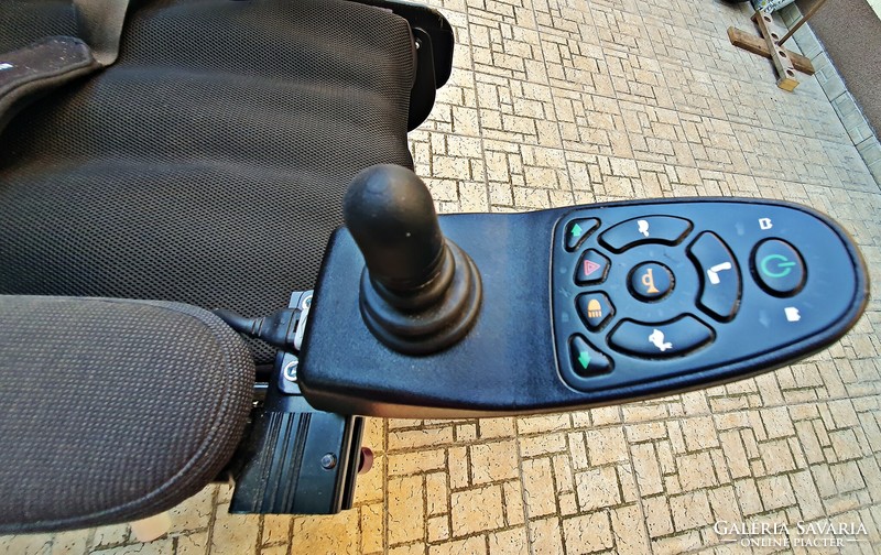 Outdoor electric wheelchair with joystick. Used, in excellent condition, for street, garden, terrace.