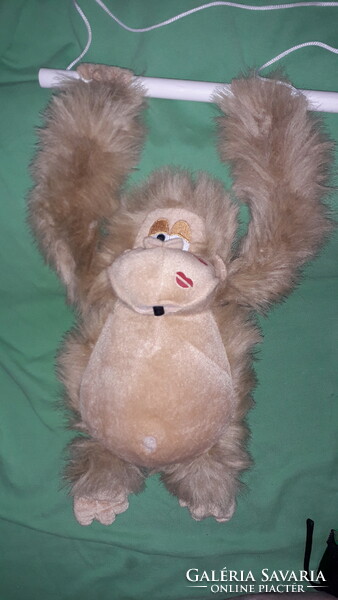 Very cute hanging, cooing, excited, moving battery-powered, lovable monkey figure 39 cm according to pictures