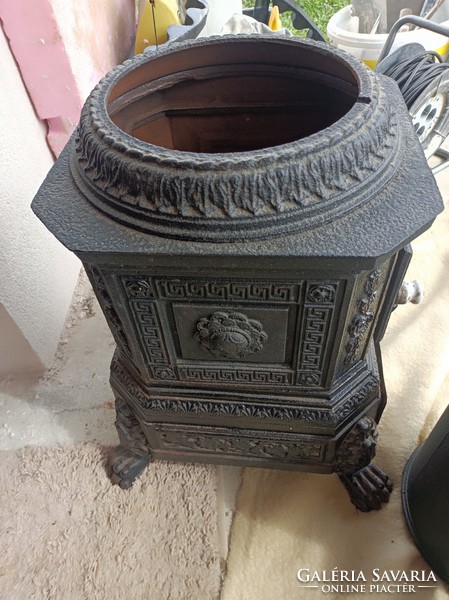 Cast iron stove, in good condition.